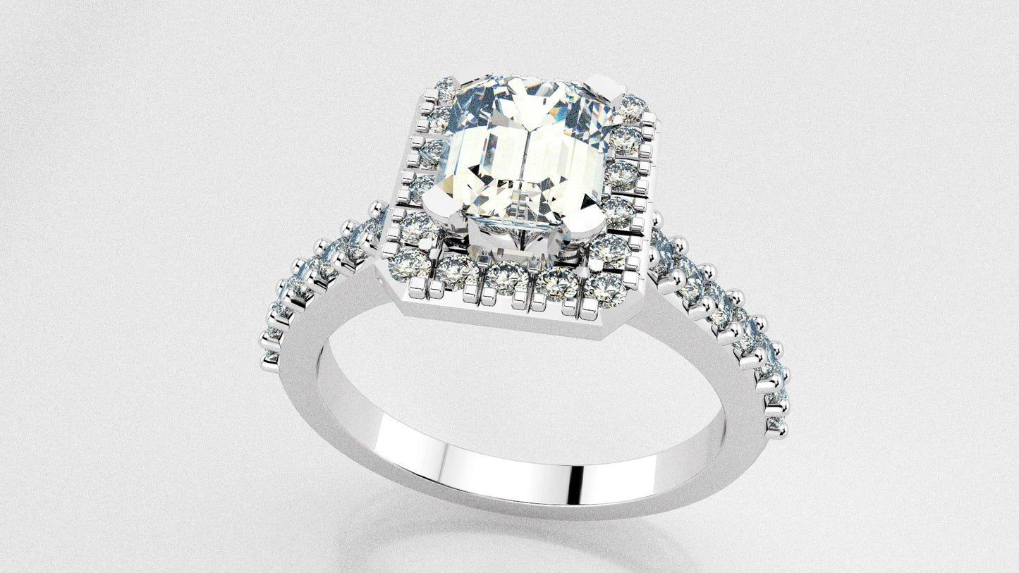 Bague halo avec diamant coupe émeraude